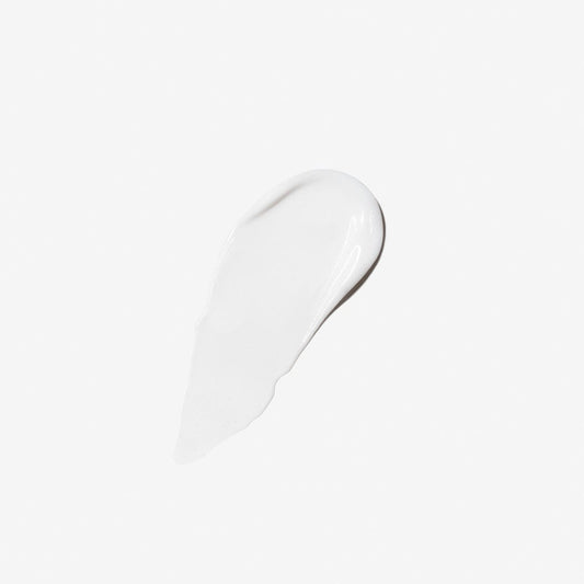 Ein Klecks Skin Smoothing Cream | Feuchtigkeitspflege mit HydraMesh Technologie™ auf einem schlichten weißen Hintergrund.