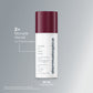 Ein weißer und kastanienbrauner Flakon von Dynamic Skin Retinol Serum (30 ml) ist vor einem grauen Hintergrund abgebildet, mit deutschem Text, der dieses wirkungsvolle Anti-Aging-Serum hervorhebt.