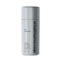 Un envase cilíndrico plateado que contiene Dermalogica Daily Superfoliant, un exfoliante en polvo renovador de la piel con carbón Binchotan, con el nombre del producto y los detalles en la etiqueta.